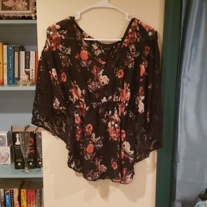 Floral blouse with singed waist